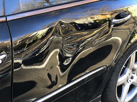 Dent before paintless dent repair, Madisonville TN