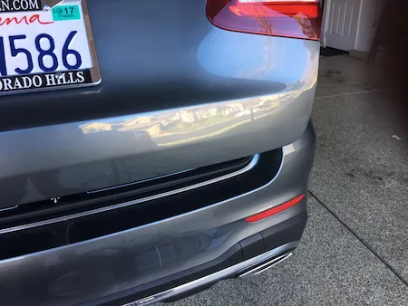 Panel after paintless dent repair on a Mercedes-Benz SUV
